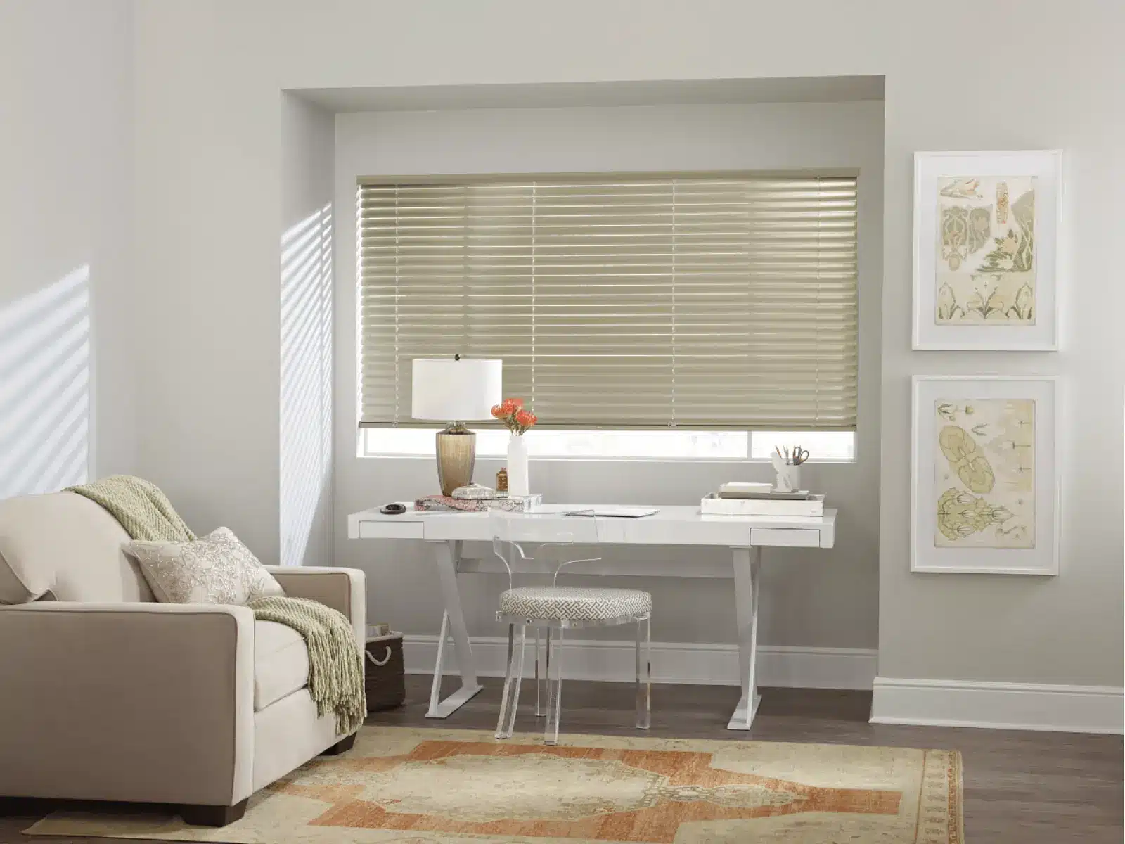 Elegant home office with large window dressed in tan wood blinds and white desk in Venice Elegant home office with large window dressed in tan wood blinds and white desk in Venice